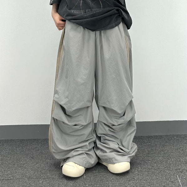 track gray parasuit pants