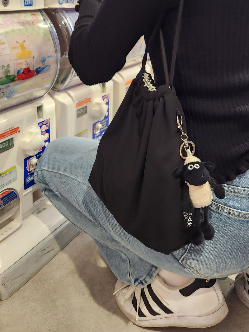 terazzo string pouch bag - black