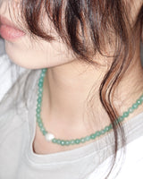 Green aventurine with pearl necklace