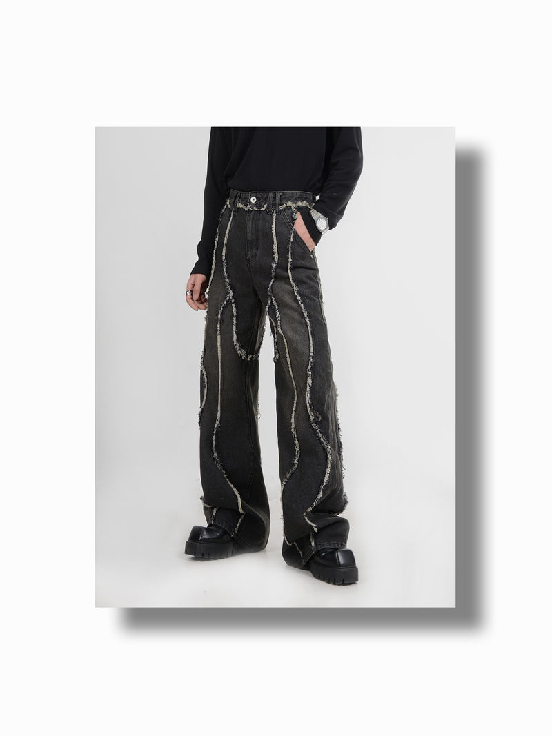 deconstructed raw edge splicing jeans