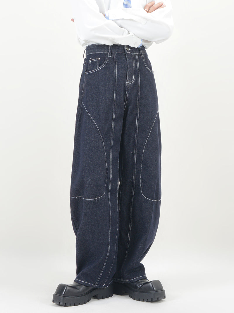 top-stitched washed dark blue jeans