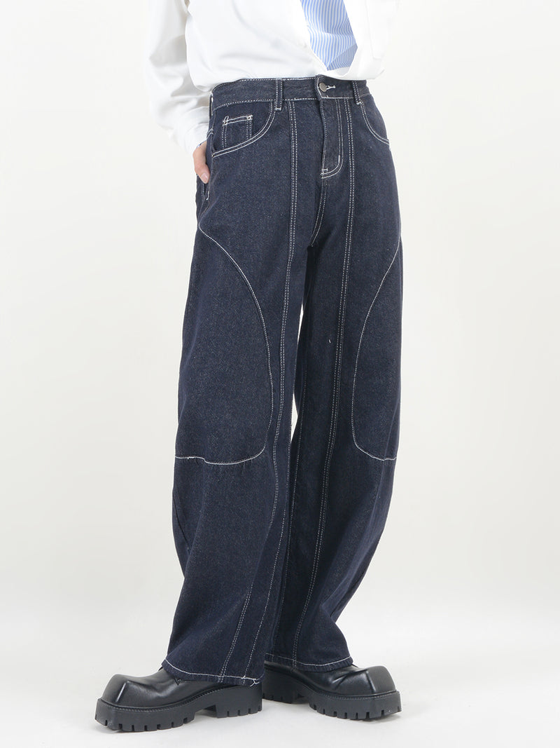 top-stitched washed dark blue jeans
