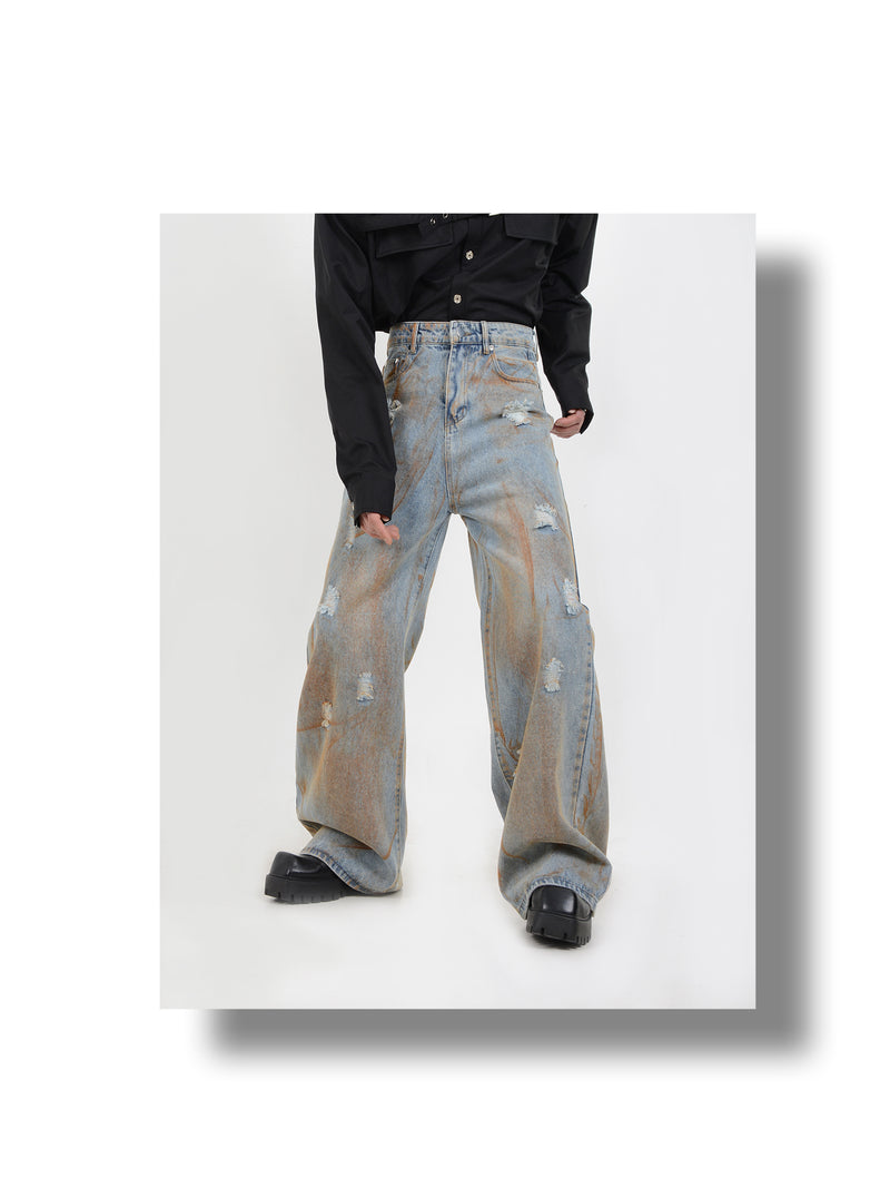 tie-dyed yellow mud distressed jeans