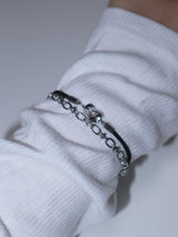 All surgical steel wave layered cord bracelet