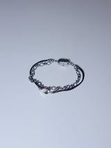 All surgical steel wave layered cord bracelet