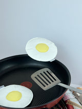The weight of a fried egg