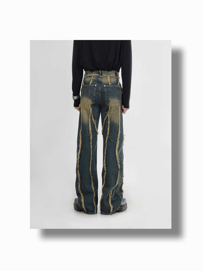 deconstructed raw edge splicing jeans