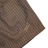 Coffee-colored loose-fitting checkered shorts with a five-part suit design