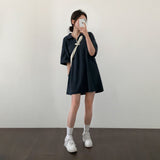 ショートスリーブドアノラックミニドレス / A short-sleeved anorak mini dress