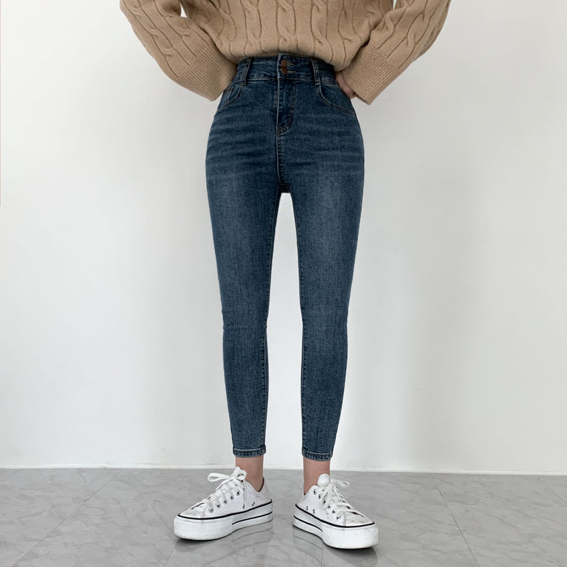 Whiskered Two-Button High Waist Skinny Jeans