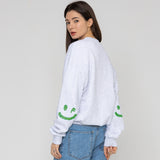 エルボーマルチフラワードローイングスマイルスウェットシャツ/ELBOW Multi-Flower Drawing Smile Sweatshirt
